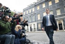 New UK finance minister reverses tax plan