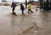 Boy swept away in California storms
