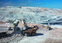 Mine excavator tips over