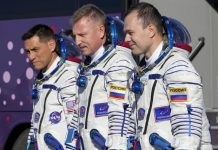 Three astronauts return to earth after a year in space