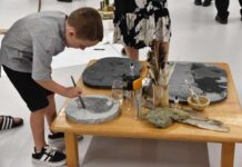 Children lead the way as world-renowned exhibition opens in Rocky