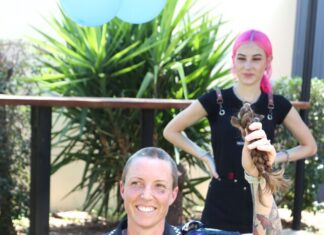 Cop lops locks for a good cause